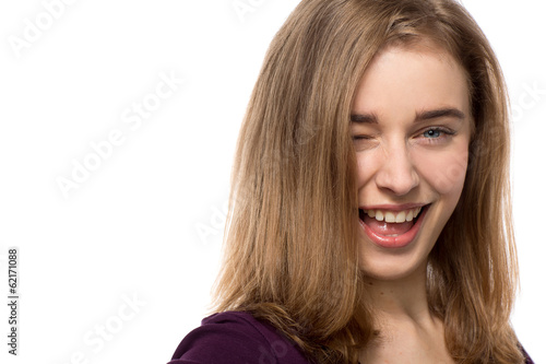 Fényképezés Sassy young woman giving a mischievous wink