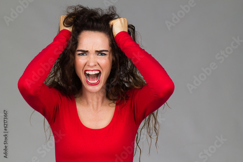 Very frustrated angry woman screaming