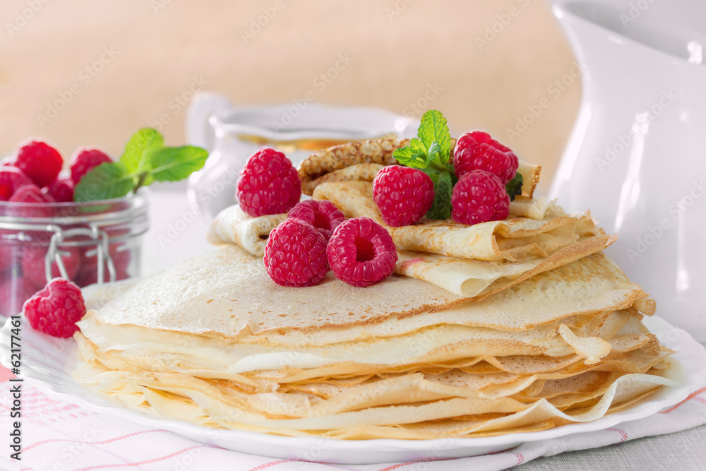 Homemade pancakes with raspberries and mint Homemade pancakes with raspberries and mint