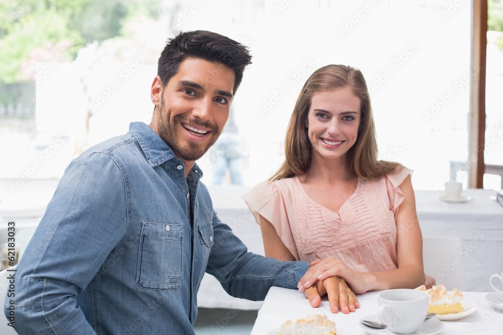 Portrait of a smiling couple at coffee shop Portrait of a smiling couple at coffee shop