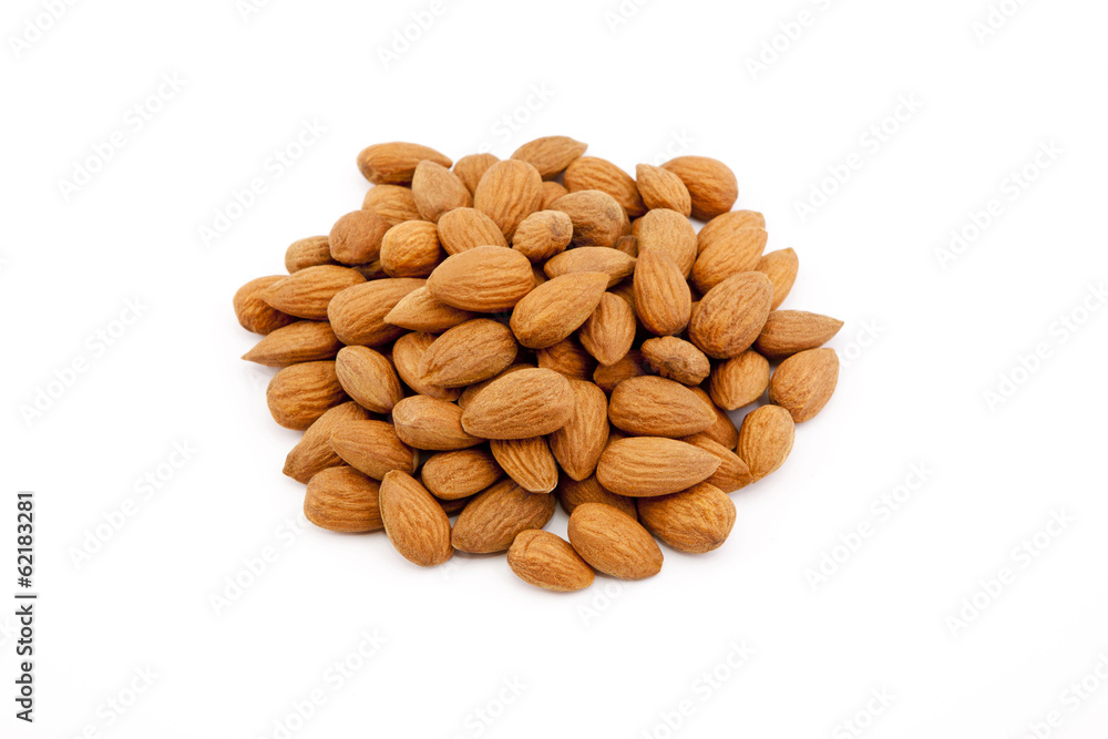 Heap of almonds isolated on white background. Heap of almonds isolated on white background.