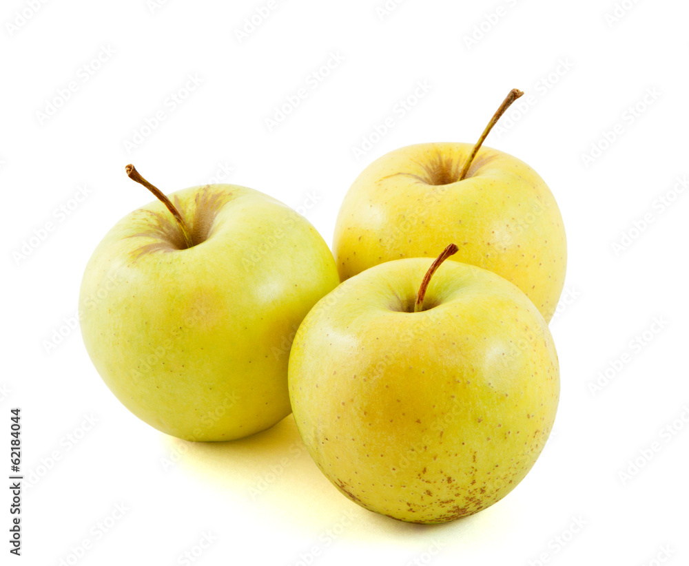 Three Golden delicious apples