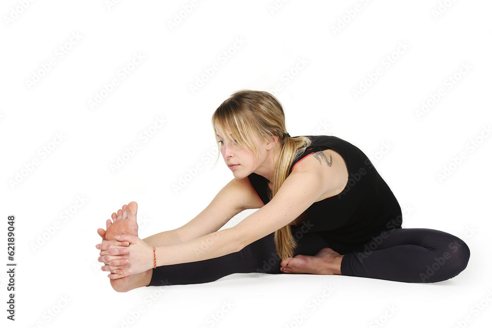 Beautiful young woman in great shape practicing yoga Beautiful young woman in great shape practicing yoga