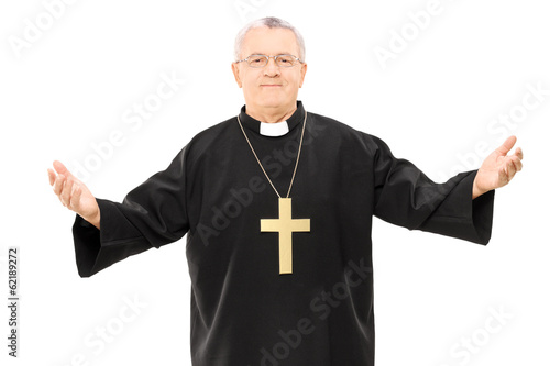 Mature reverend in black mantle with open hands