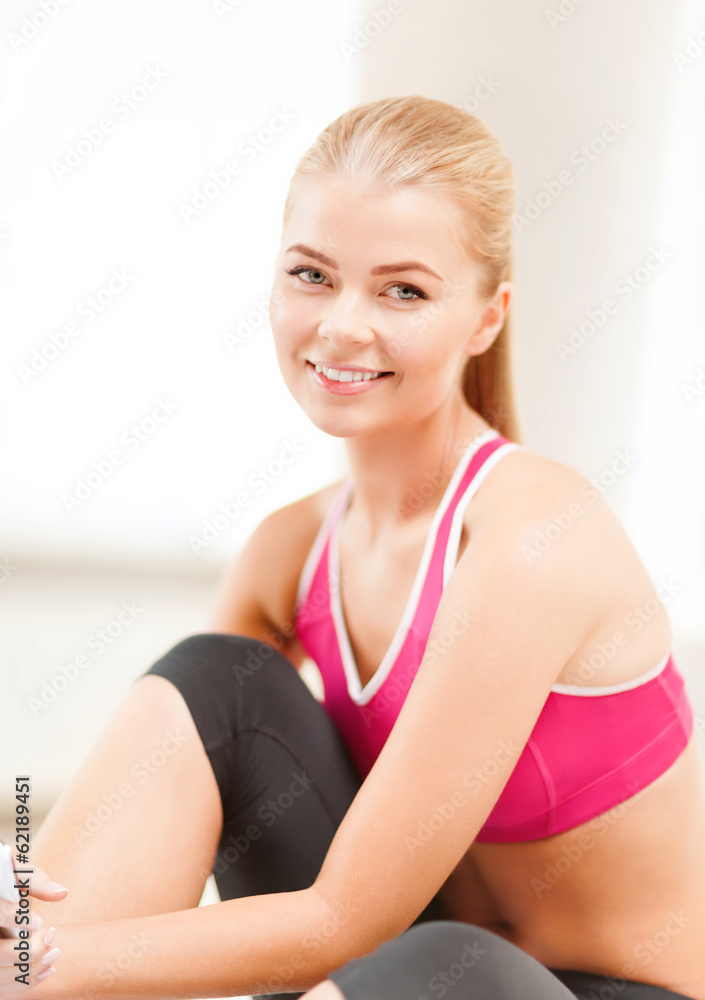 beautiful sporty woman having break in gym beautiful sporty woman having break in gym