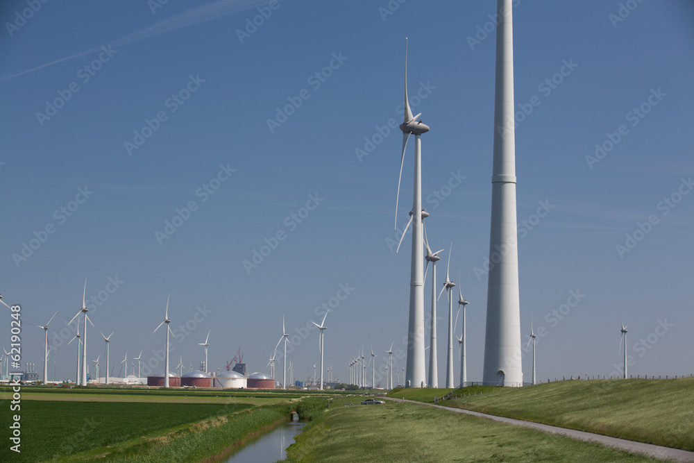 Windfarm with a clear blue sky producing alternative energy