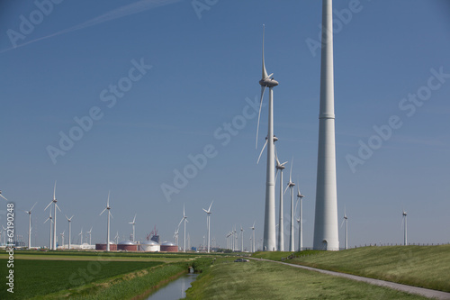 Obraz na płótnie Windfarm with a clear blue sky producing alternative energy w salonie