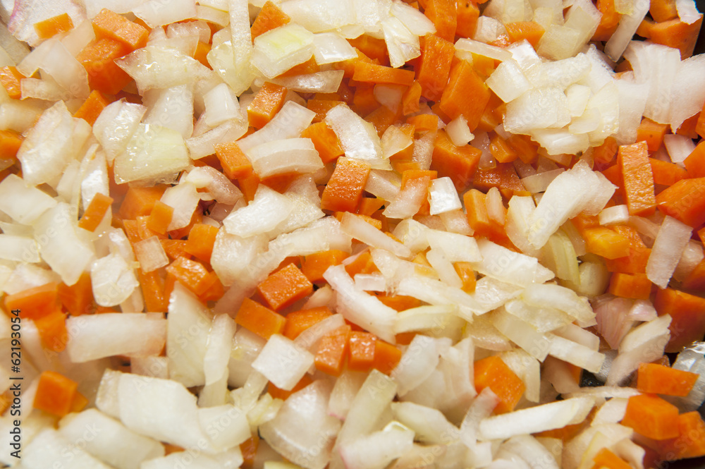 Closeup of chopped vegetables - carrot, onion, garlic Closeup of chopped vegetables - carrot, onion, garlic