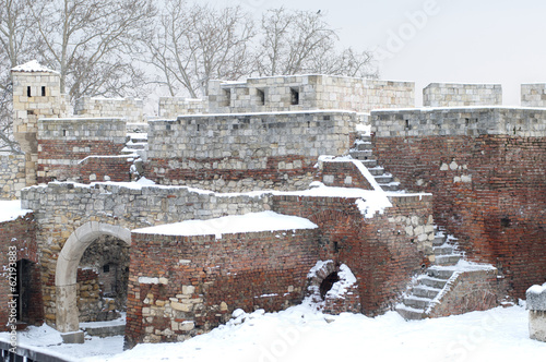 Ruins of medieval gates of the old fortress photo