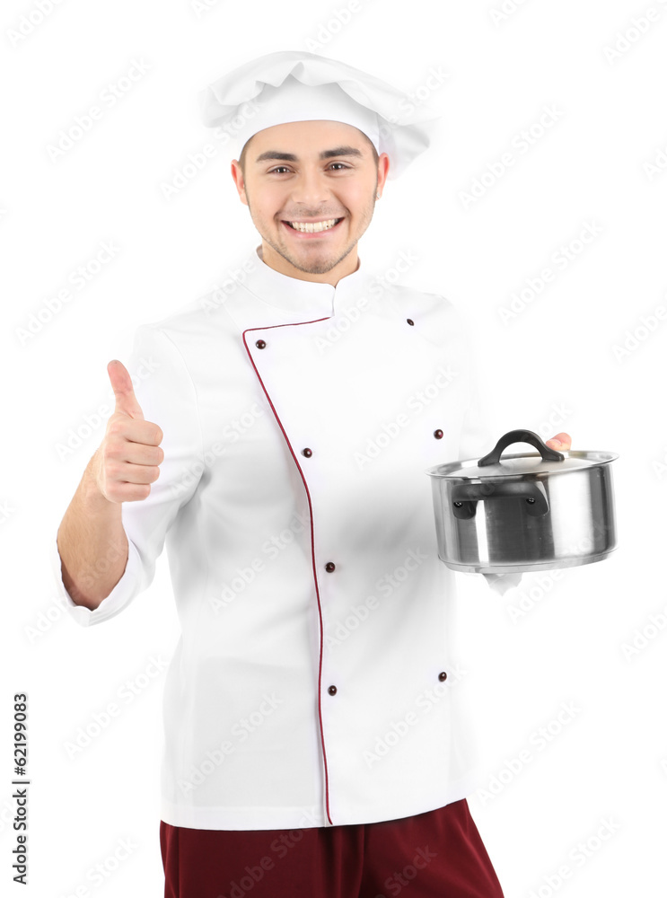 Professional chef in white uniform and hat, holding pan in his Professional chef in white uniform and hat, holding pan in his