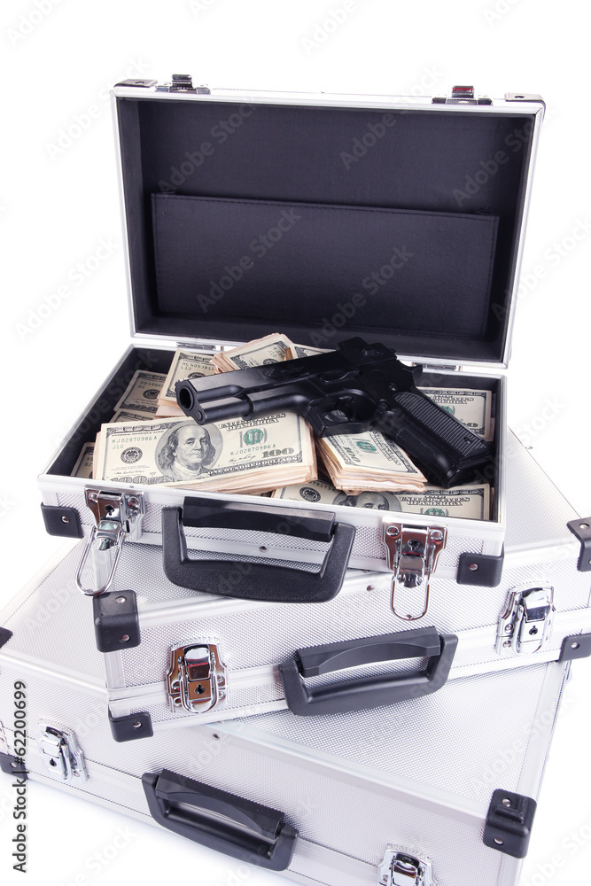 Cases with money and guns, isolated on white Cases with money and guns, isolated on white