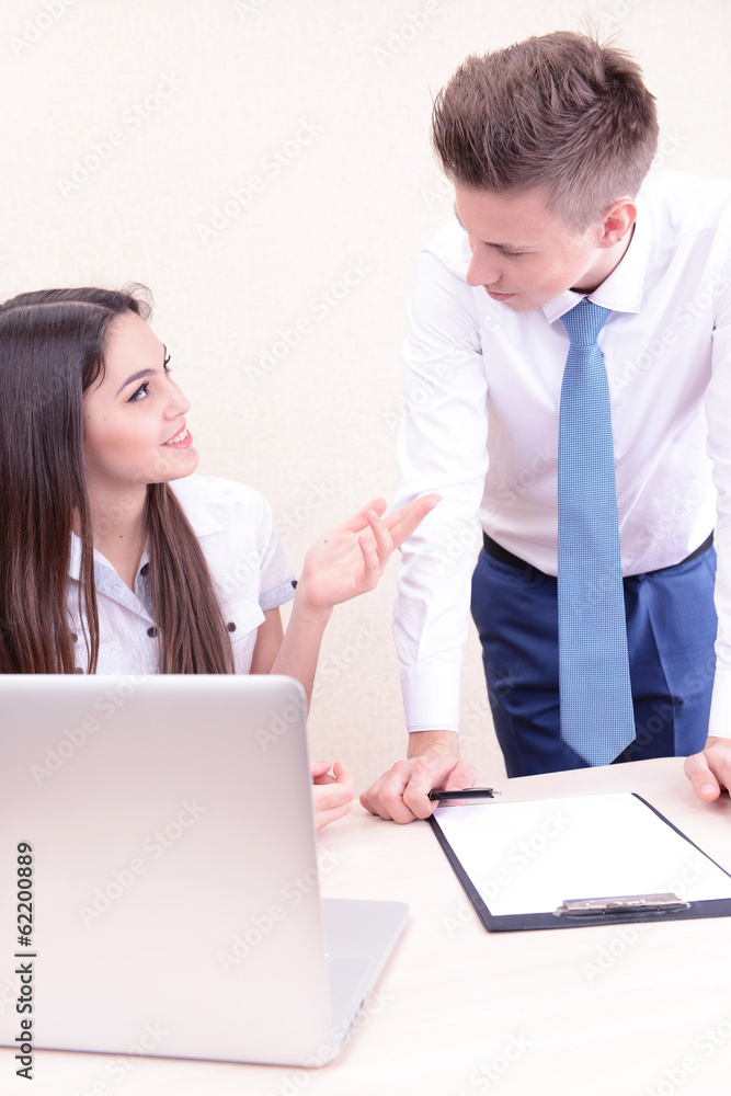 Successful young businesspeople working at office Successful young businesspeople working at office