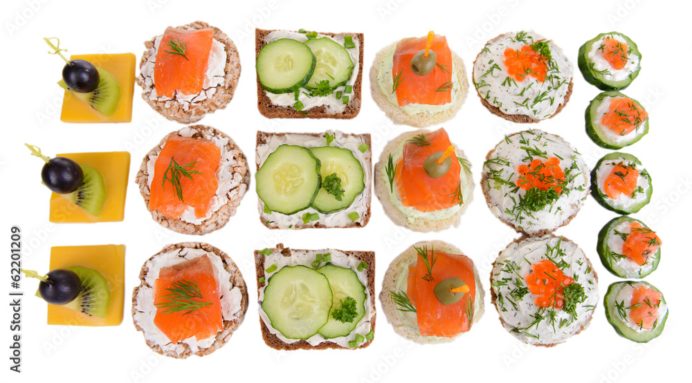 Delicious canapes isolated on white Delicious canapes isolated on white