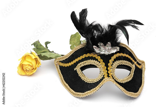 carnival mask and rose isolated on white background