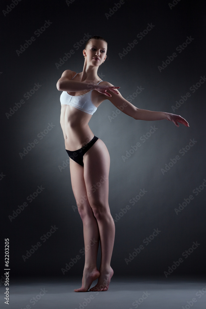 Sensual young model posing in dance pose Sensual young model posing in dance pose
