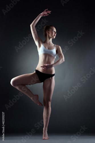 Image of graceful girl posing in dance pose
