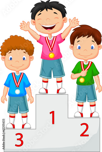 Little boy celebrates his golden medal on podium