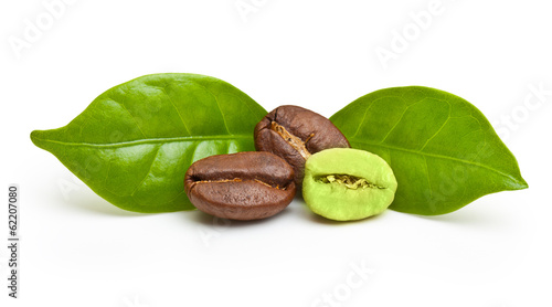 Green and black coffee beans on white background.