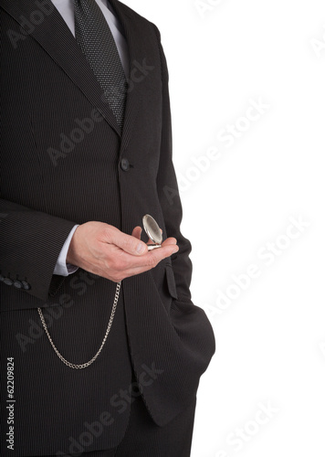businessman with a pocket watch in his hand.