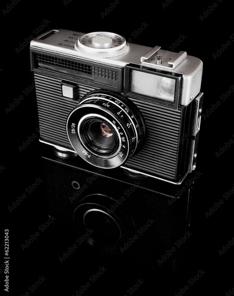 old camera on black background - obrazy, fototapety, plakaty 