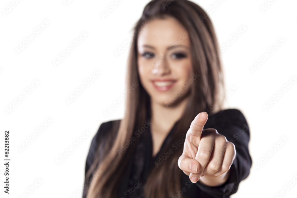 young smiling beautiful woman touching an empty space young smiling beautiful woman touching an empty space