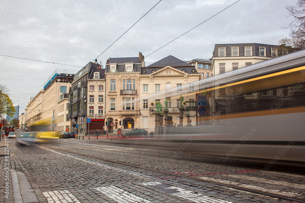 Tramway in motion on the street of Brussels near The Sablon Squa