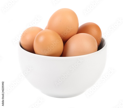Bowl with brown eggs.