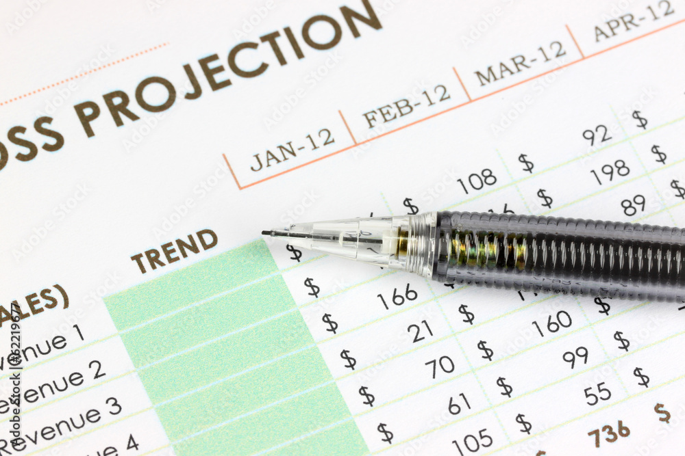 Mechanical pencil point to Trend text on business graph. Mechanical pencil point to Trend text on business graph.