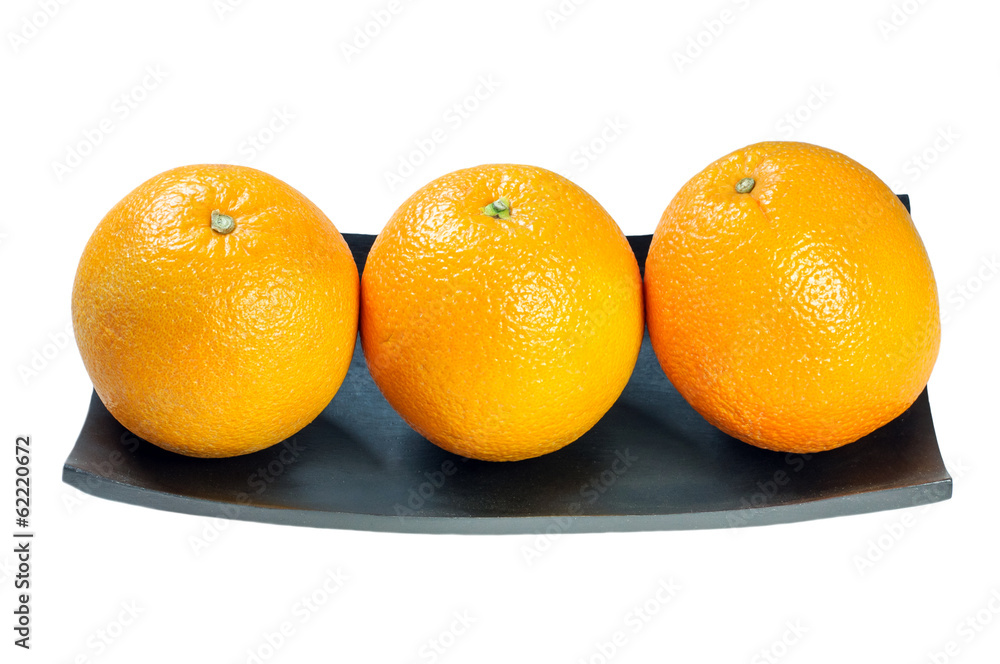 Three Orange on wooden tray on the white background Three Orange on wooden tray on the white background