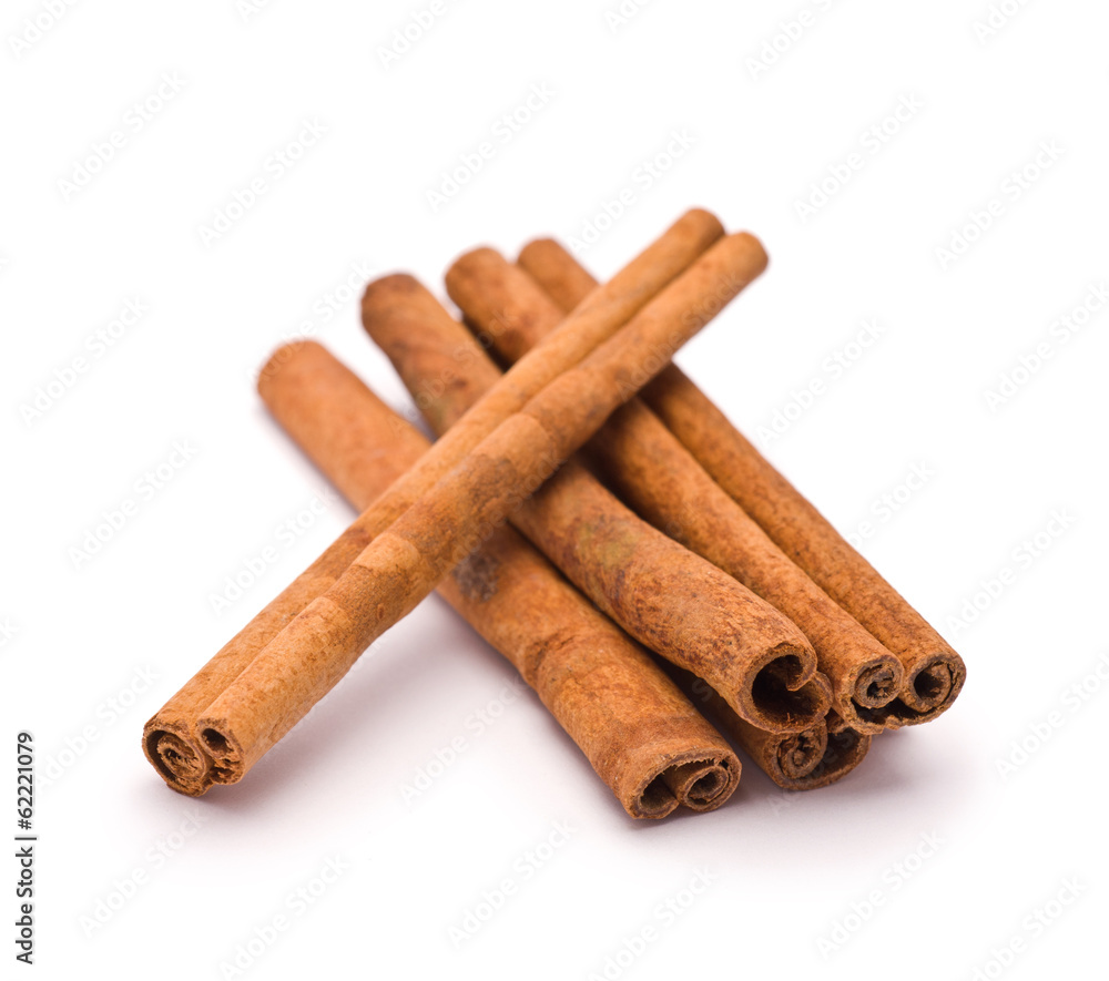 Heap of Cinnamon isolated on white