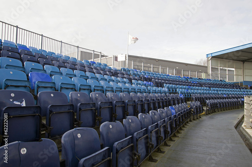 Blue chairs in a baseball stadium