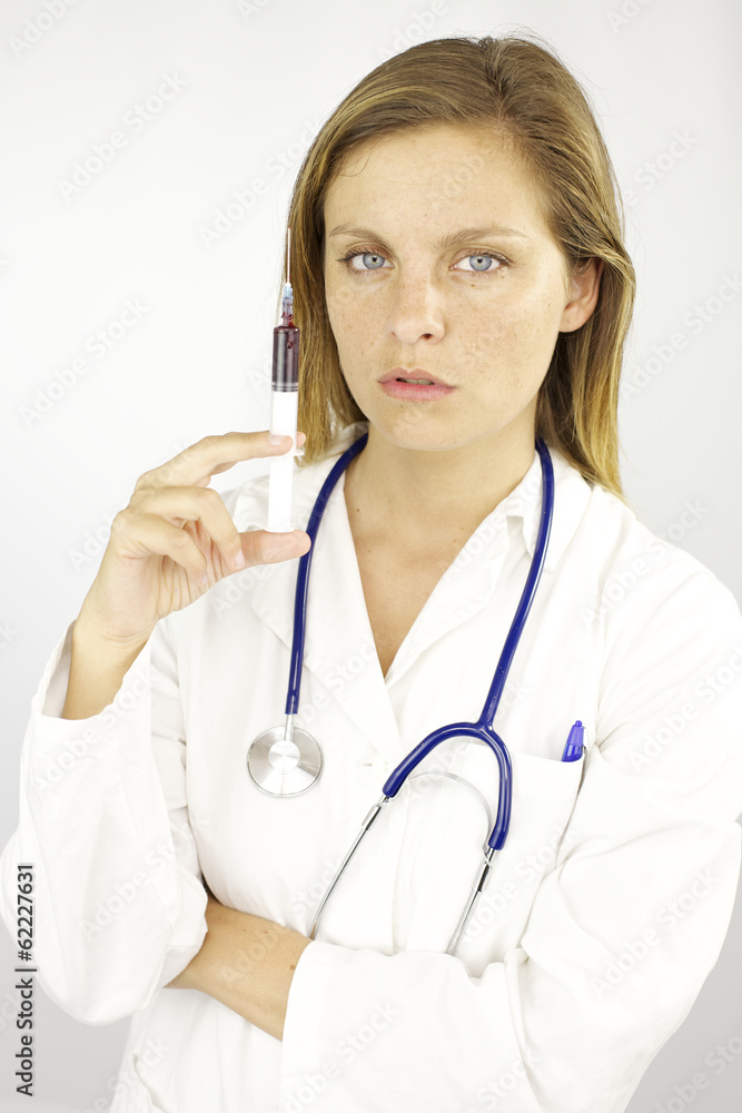 Doctor with siringe full of blood ready for test Doctor with siringe full of blood ready for test