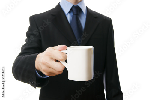Men in a suit with a cup in hand
