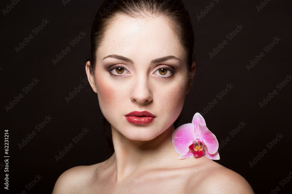 Beautiful woman with orchid Beautiful woman with orchid