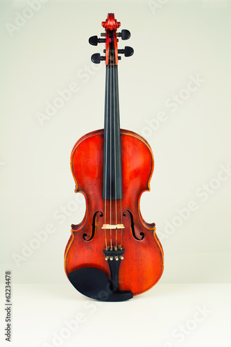 Vintage violin in white background