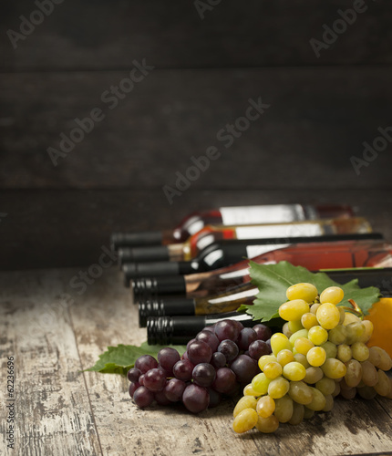 wine bottles and grape
