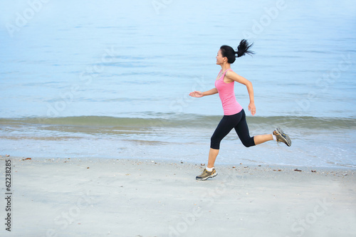 woman running at beach