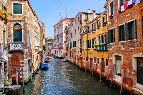 View down the picturesque canals of Venice, Italy © Jenifoto