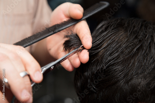 Men's haircut scissors at salon © schankz