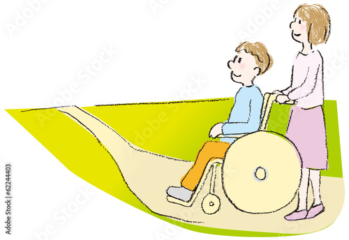 車いすの人と道