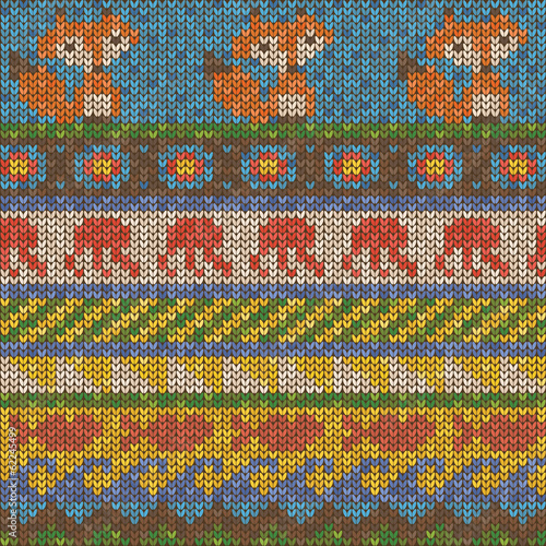 Colorful knitted sweater with foxes, octopus and fish