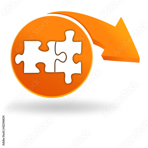 pièce de puzzle sur bouton orange