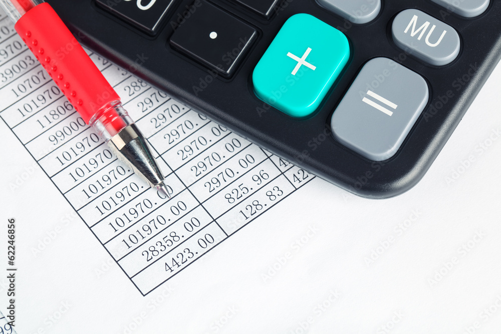 calculator and red pen calculator and red pen