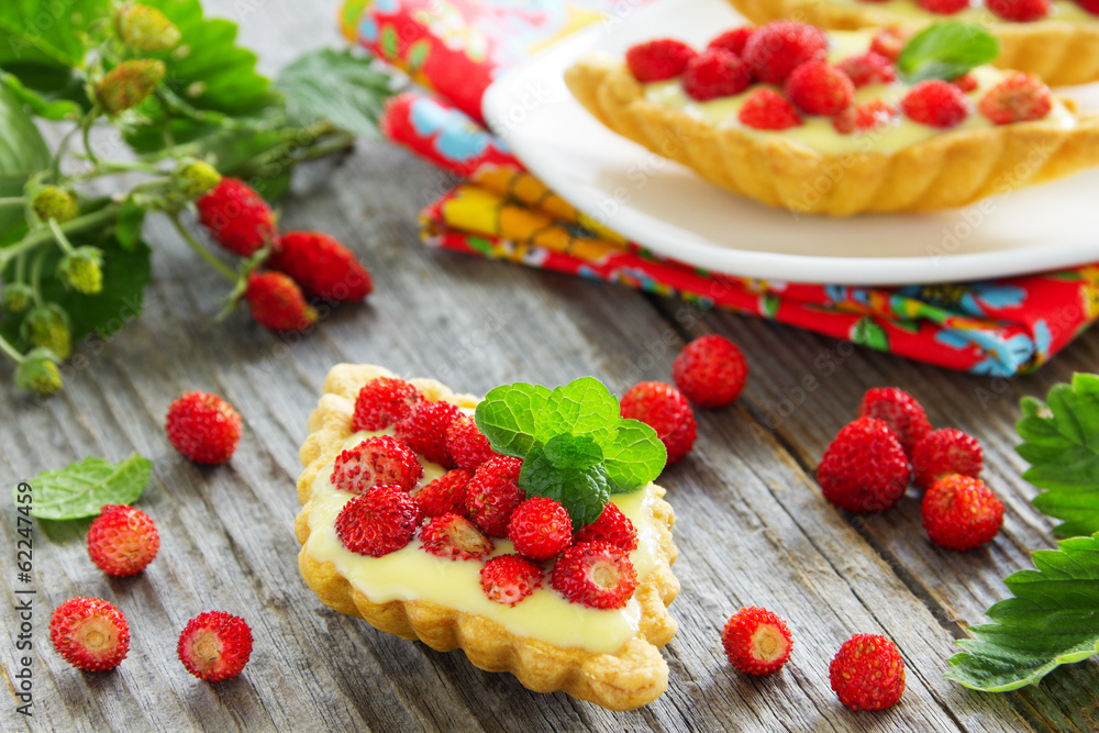 Tartlets with custard and strawberries. Tartlets with custard and strawberries.