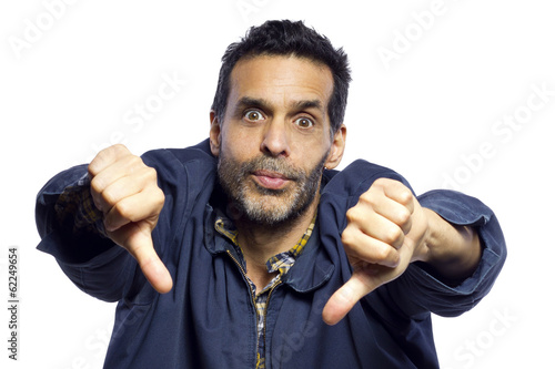 blue collar worker dissaproving with a thumbs down gesture photo