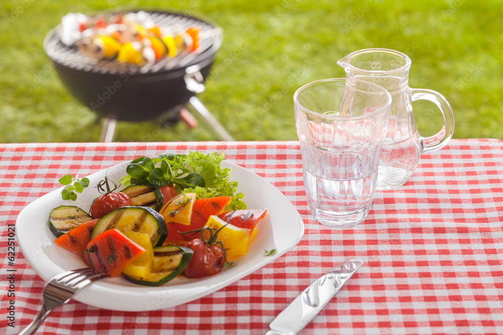 Serving of roast vegetables on a summer picnic Serving of roast vegetables on a summer picnic