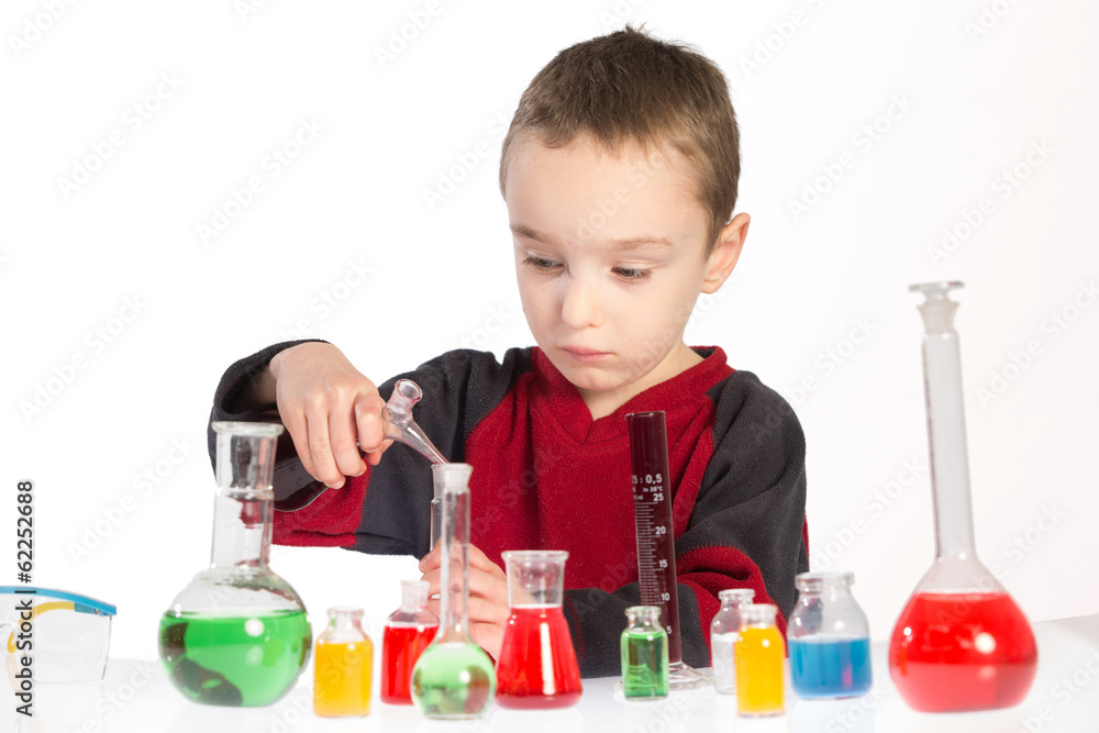 Child in chemistry class, chemistry lesson Child in chemistry class, chemistry lesson