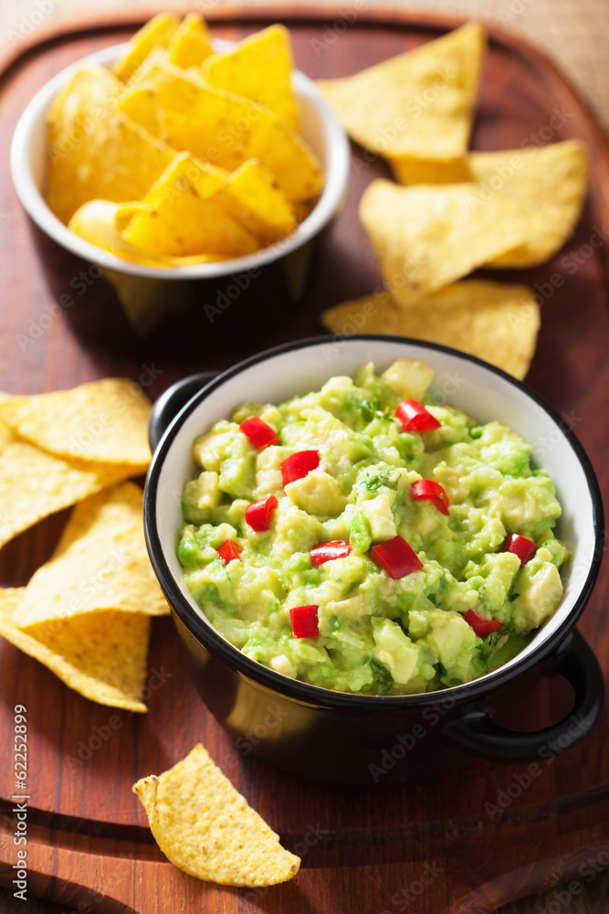 guacamole with avocado, lime, chili and tortilla chips guacamole with avocado, lime, chili and tortilla chips