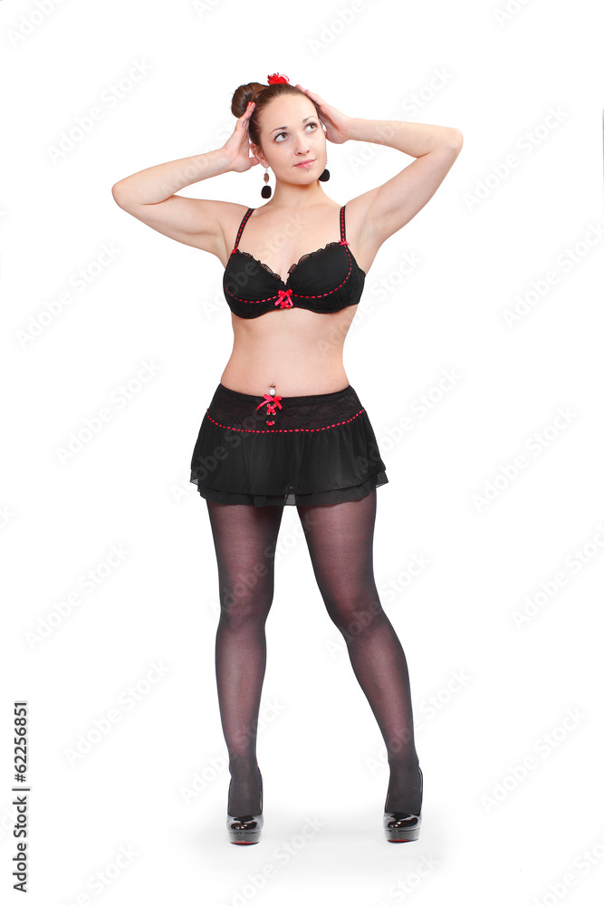 Attractive woman in underwear posing on a white background. Attractive woman in underwear posing on a white background.