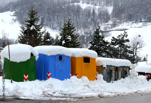 rubbish bins and bins for separate waste collection in a mountai photo